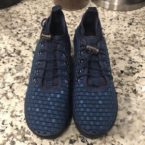 Steve Madden blue cross weave wedge sneakers.